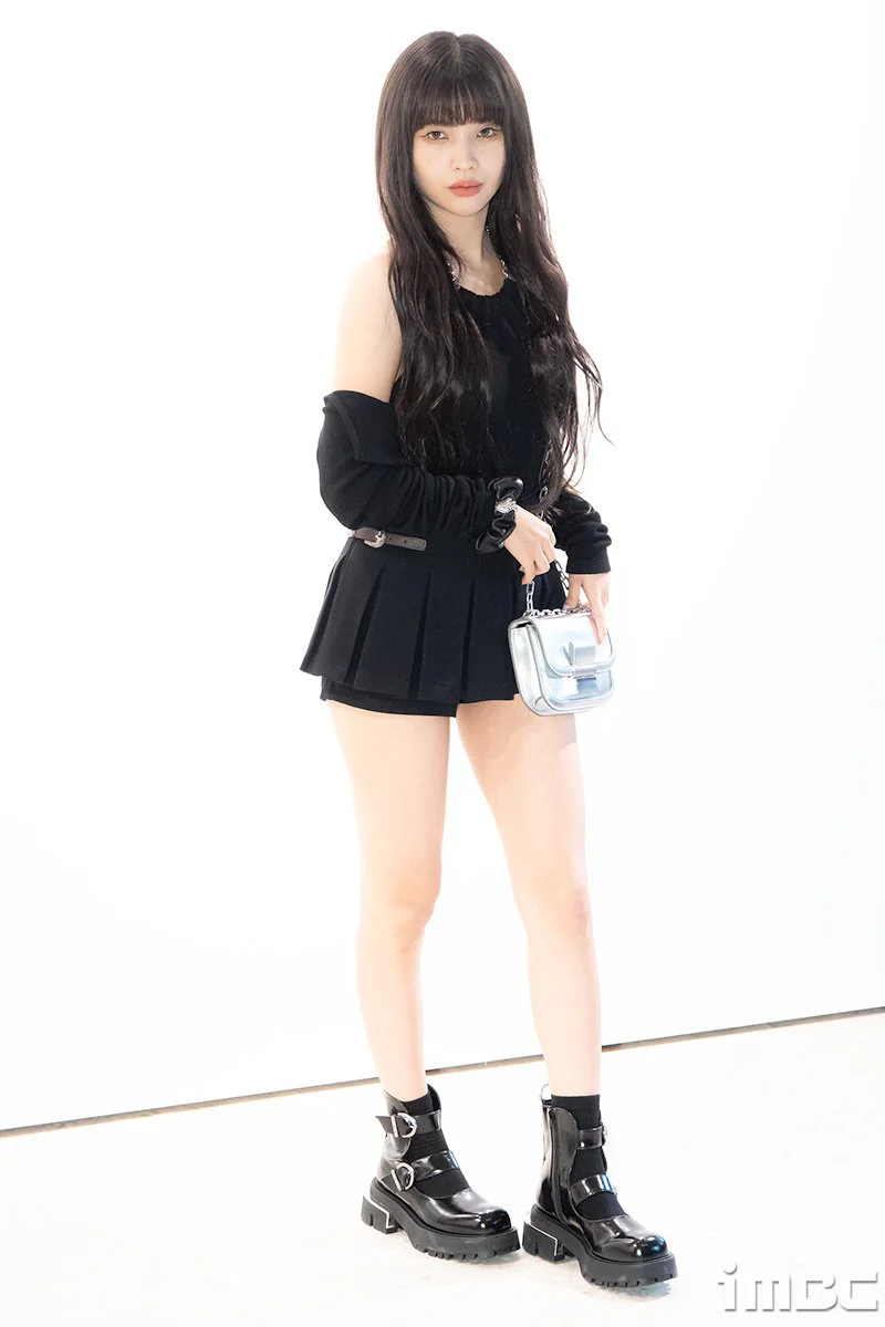 Soyeon from (G)I-DLE also wore an all-black outfit but added a touch of boldness with a backless dress and stylish boots.