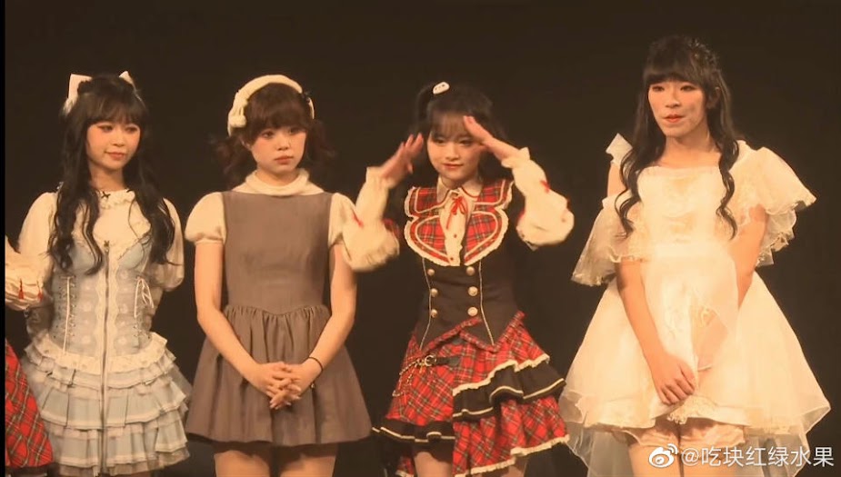 Lingdang was actually (far right) male but was dressed in female attire by the agency.