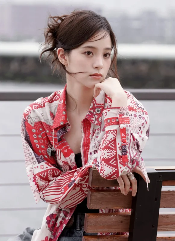 taiwan celebrity investigation 2025portrait-woman-patternedShirt-pensive.