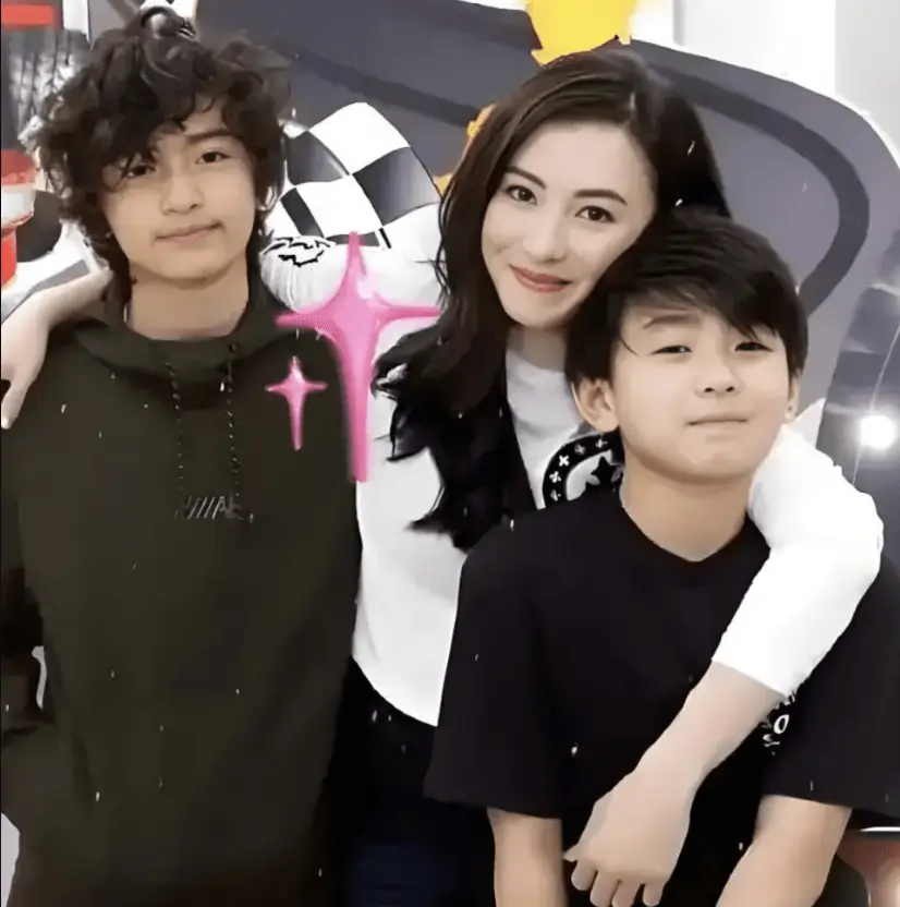 cecilia cheung nicholas tseFamily-Smiling-Hugging-Racecar.