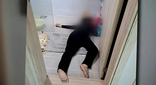 shocking real-life Korean storybathroom-lying-doorway-tiled' 'floor.