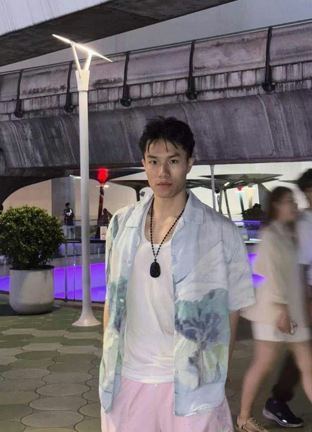 Chinese model Myanmar traffickingperson-outdoors-necklace-shirt