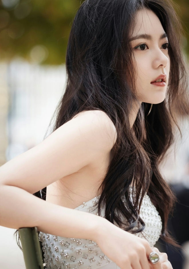 Zhao Jinmai viral close-upportrait-woman-dress-jewelry.