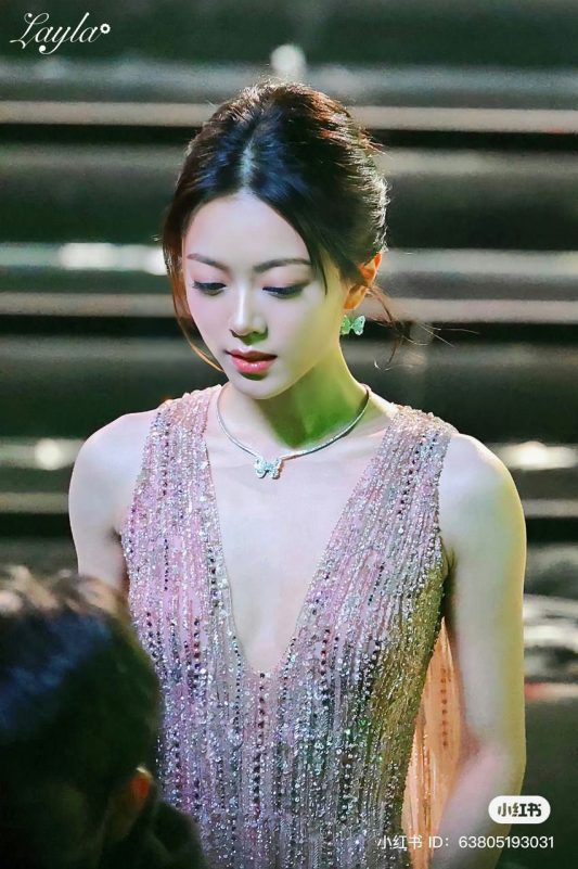 Zhao Jinmai viral close-upwoman-dress-jewelry-lookingdown.