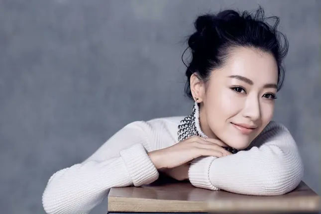 Bai Bing fading beautyportrait-woman-sweater-smiling.