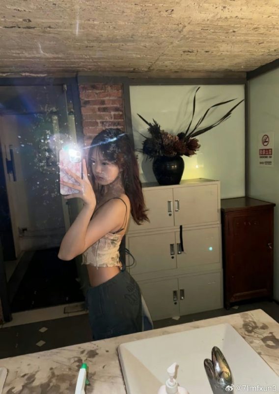 Jaden Chloe Yen Christy Chungselfie' 'woman' 'bathroom' 'mirror.