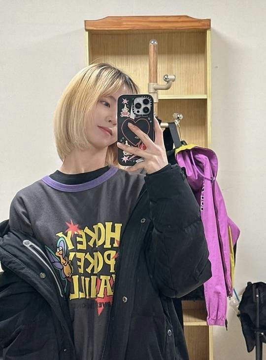 Kim Ji-in Our Unwritten Seoulselfie' 'blonde' 'hair' 'puffer' 'jacket' 'phone' 'case.