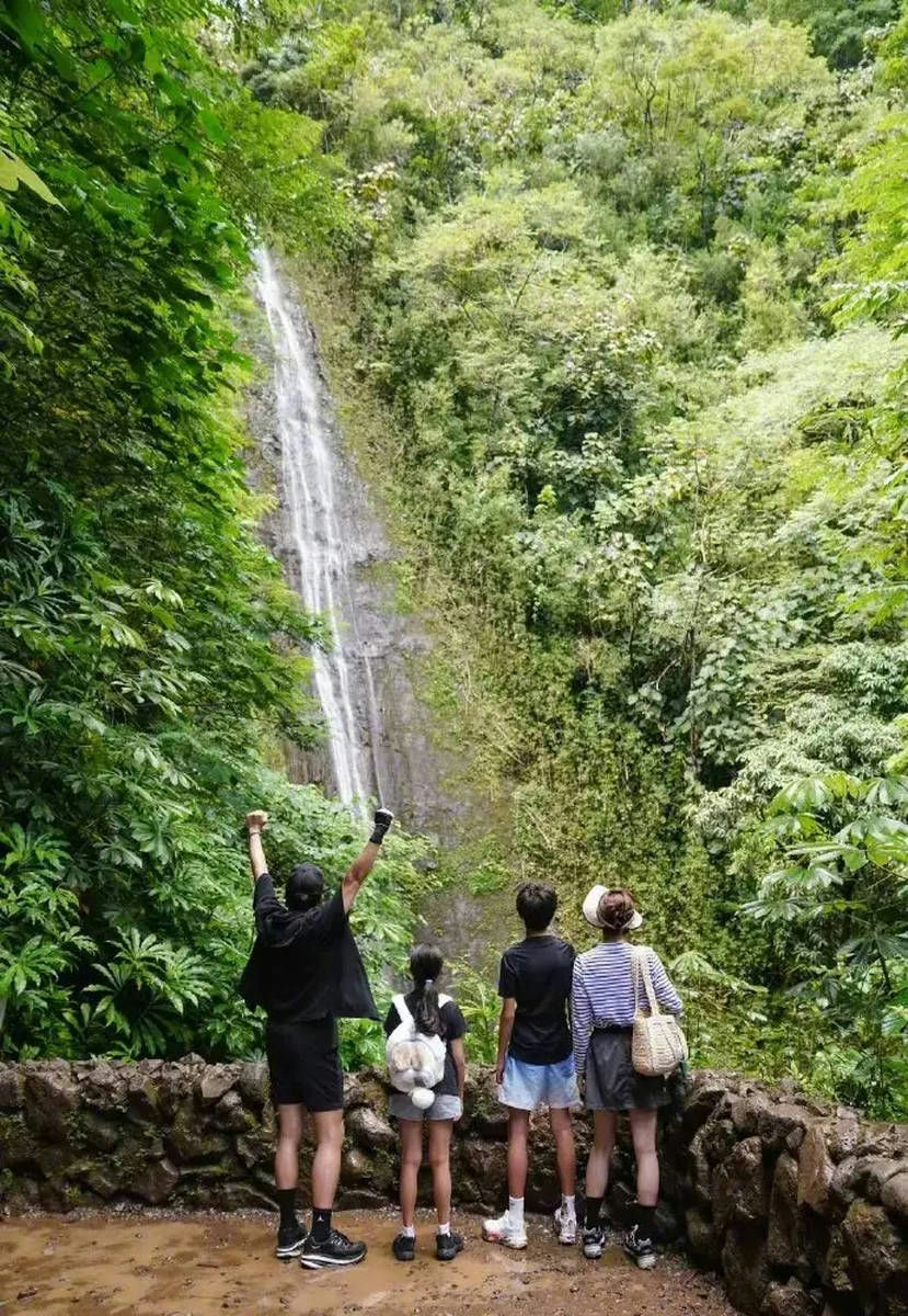 Sun Li family trekkingwaterfall' 'family' 'jungle' 'view.