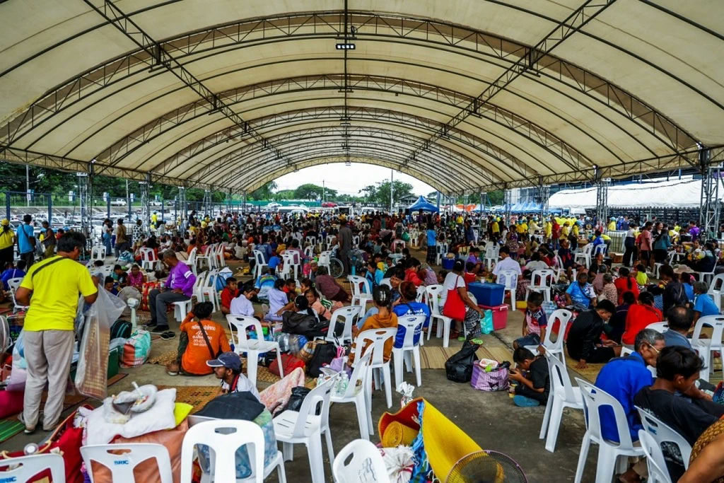 Thailand Cambodia border conflict 2025large' 'group' 'covered' 'area' 'plastic' 'chairs' 'waiting.