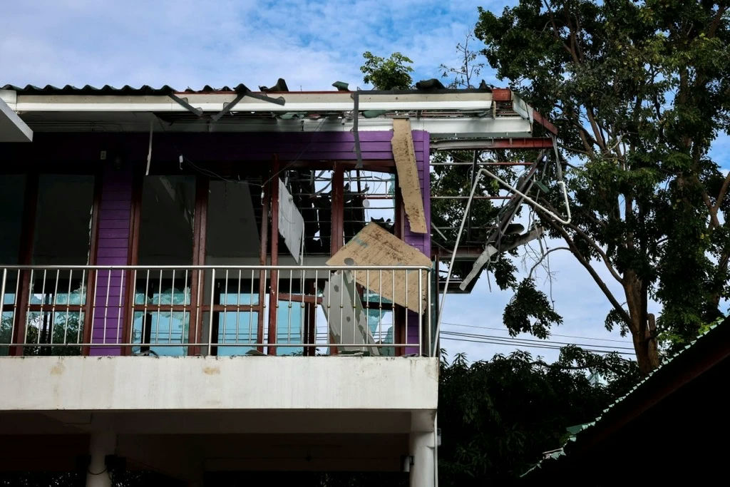 Thailand Cambodia border conflict 2025damage' 'building' 'purple' 'balcony.