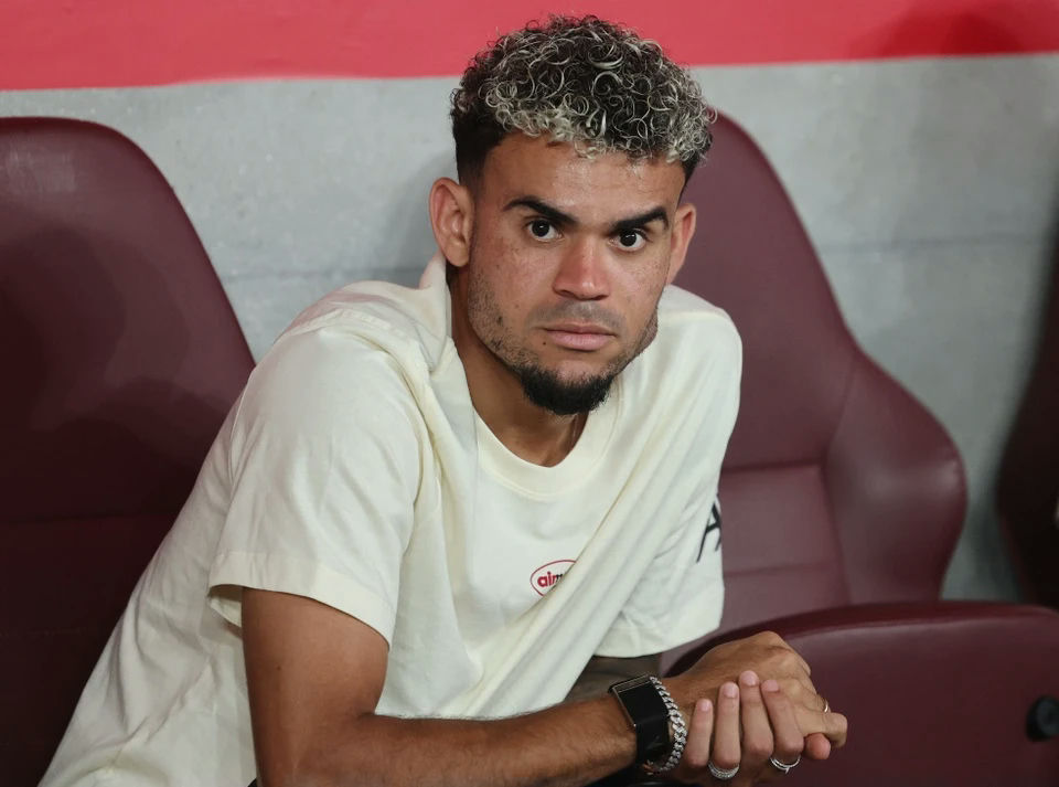 Liverpool sell Luis Diaz to Bayern Munichman' 'sitting' 'curly' 'air' 'wristwatch.