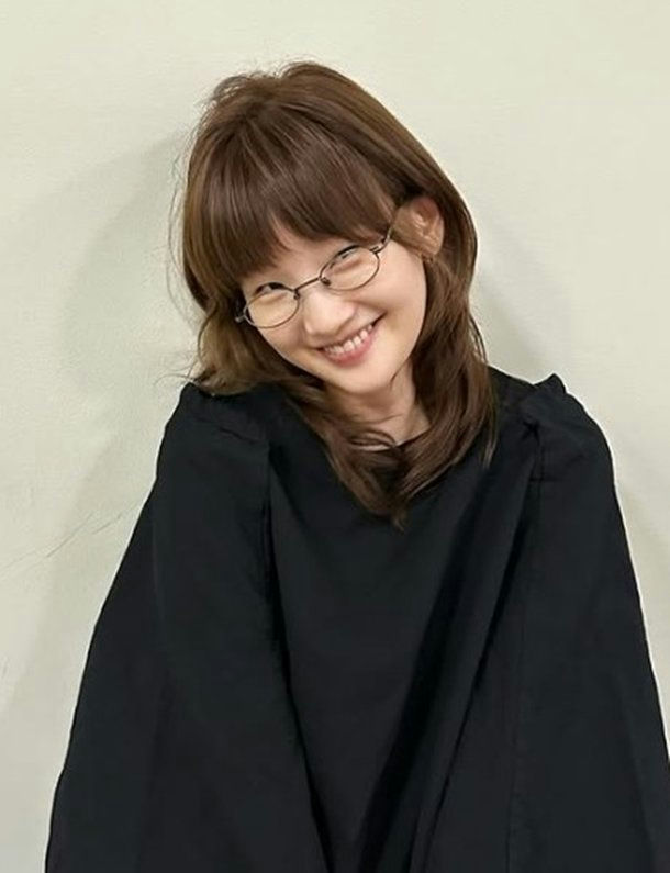Park So-dam transformationwoman' 'smiling' 'glasses' 'blacktop.