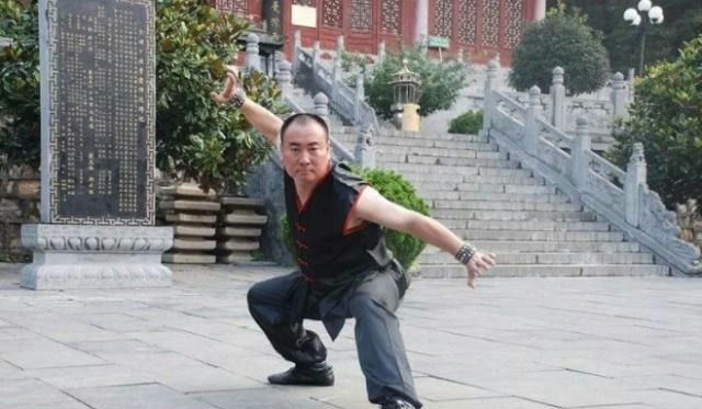 Shaolin Temple scandal Shi Yongxin Ashton Chenmartial' 'arts' 'man' 'monument' 'outdoors.