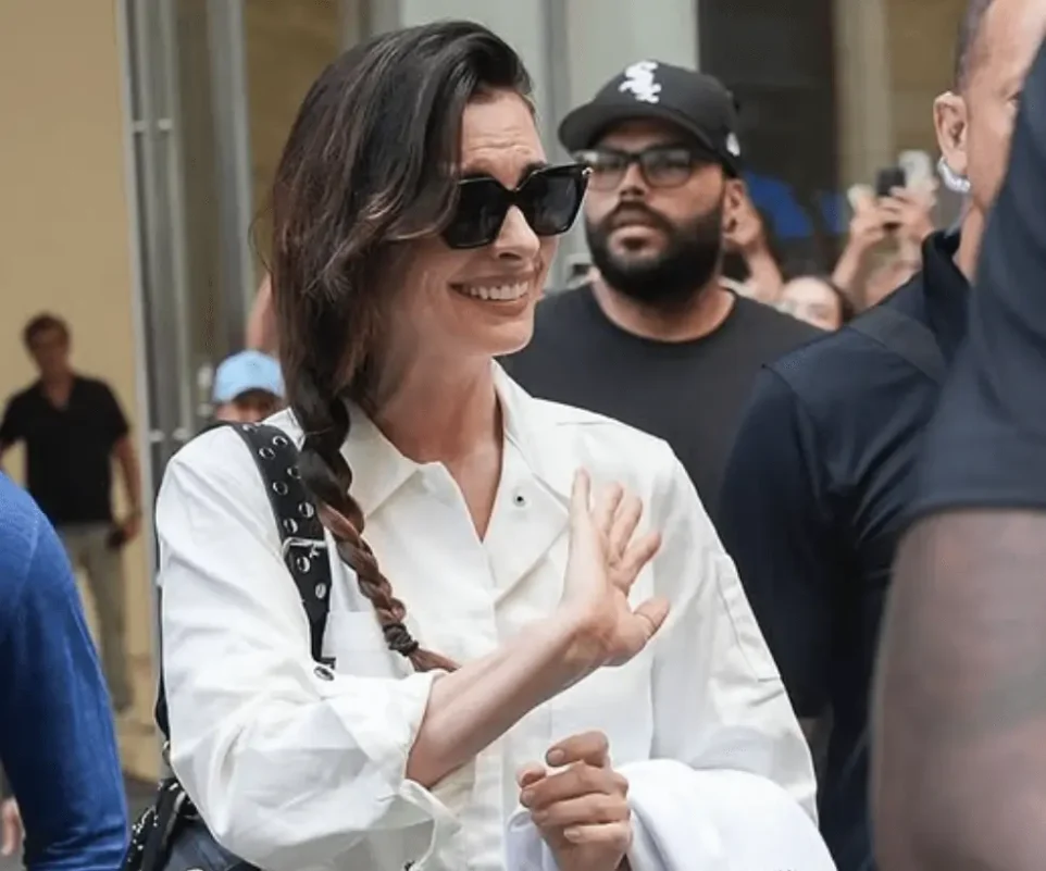 Anne Hathaway The Devil Wears Prada 2woman' 'braid' 'sunglasses' 'white' 'shirt.