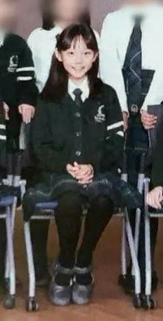 Youngseo Branksome Hall Asiapeople' 'girl' 'uniform' 'seated' 'smiling' '' '.