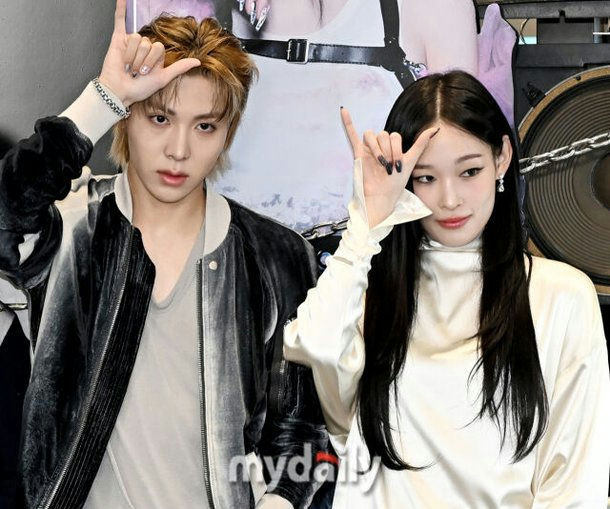 ALLDAY PROJECT Woochan Annie lovelinetwo' 'posing' 'fingers' 'fashion' 'stylish.