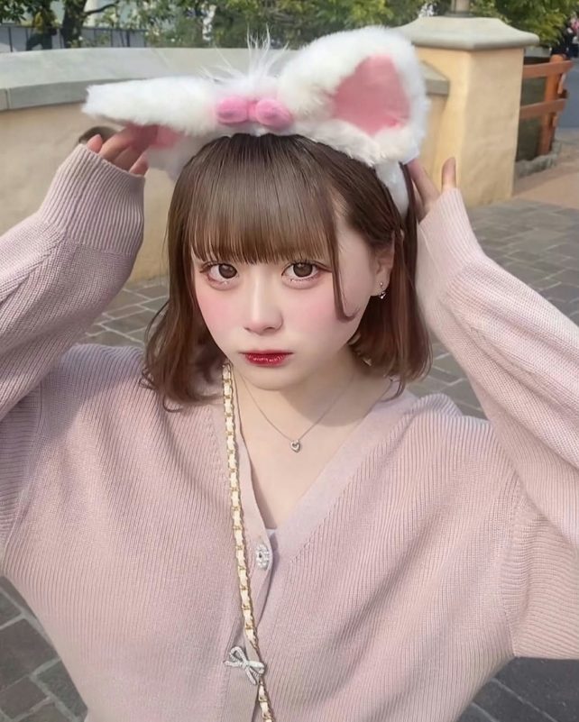 Pretty Chuu idol rape scandalpeople' 'woman' 'bunny' 'ears' 'sweater' 'necklace.