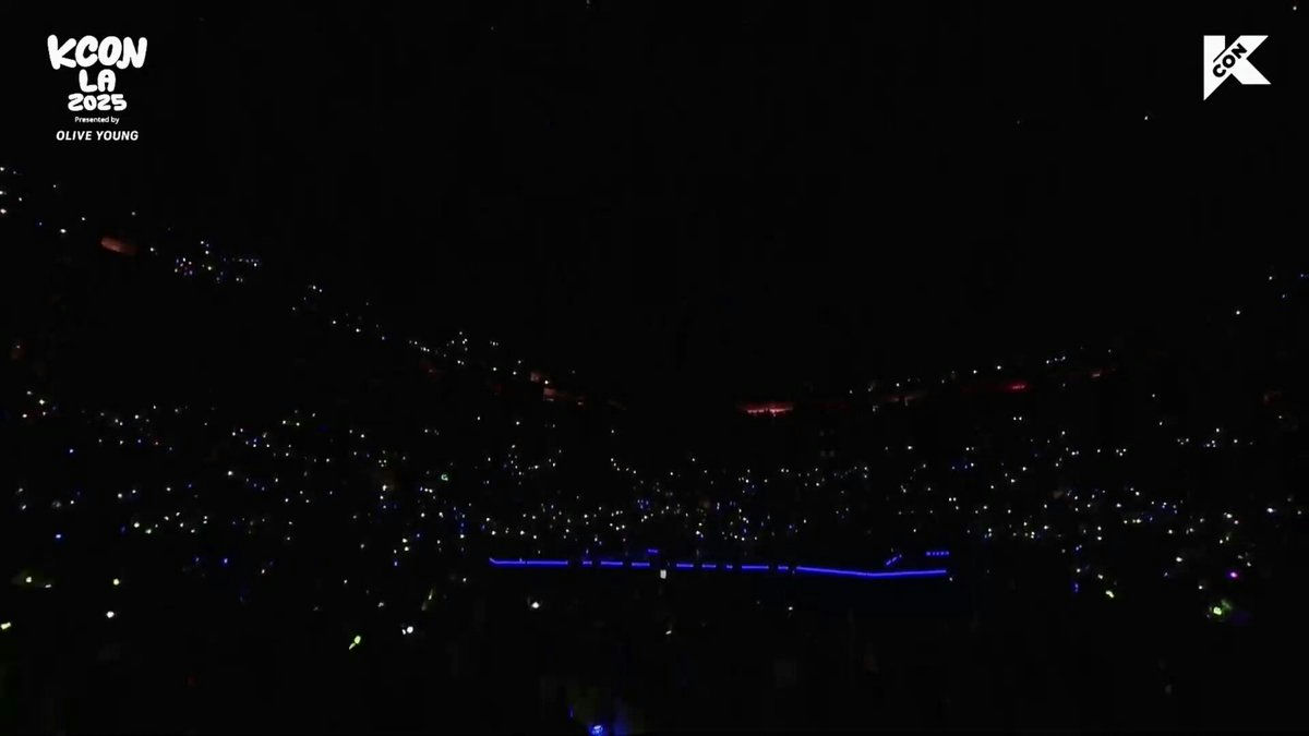 IZNA Golden KCON performance controversypeople' 'audience' 'light' 'concert' 'night.