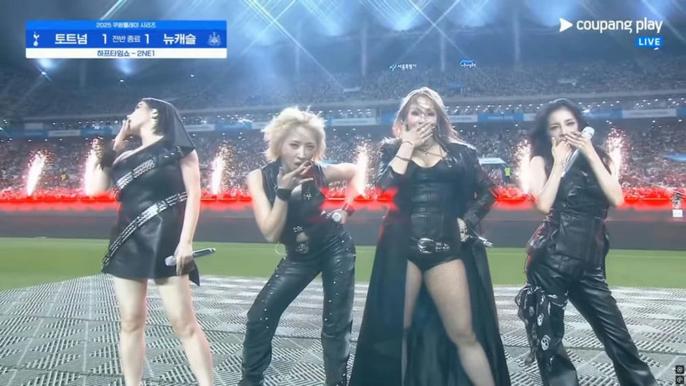 2NE1 halftime performance Seoulpeople' 'women' 'performing' 'leather' 'stage' '' '.