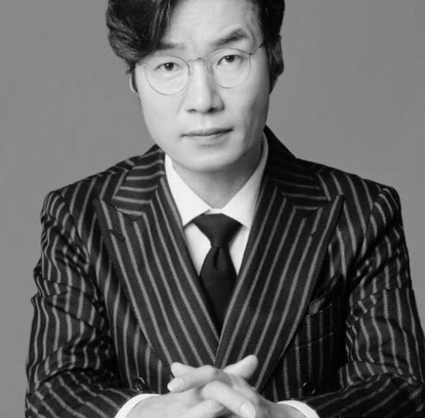 Song Young-kyu basement living familyman' 'glasses' 'suit' 'formal' 'black' 'and' 'white.