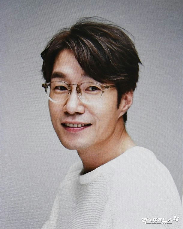 Song Young-kyu funeralperson' 'smiling' 'glasses' 'white' 'shirt' 'asian.