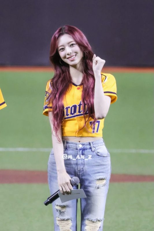 Yuna ITZY body controversypeople' 'woman' 'baseball' 'jersey' 'microphone' 'ripped' 'jeans.