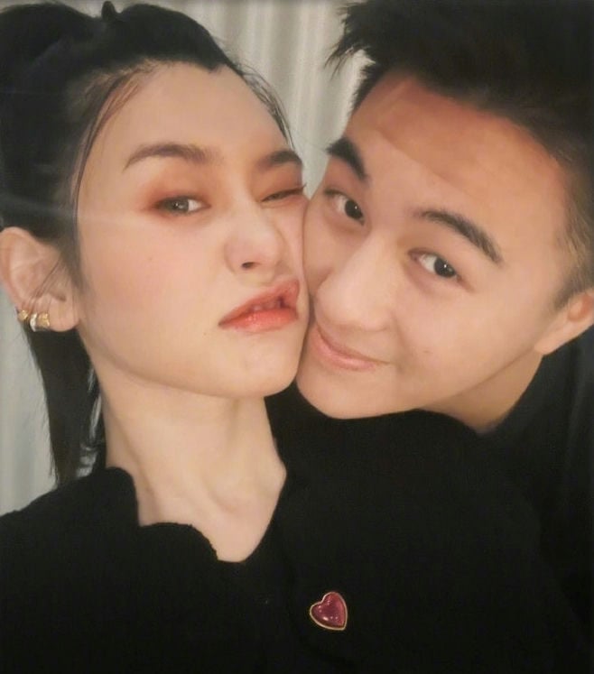 Mario Ho infidelity scandaltwo' 'people' 'couple' 'selfie' 'affectionate' 'casual' '.