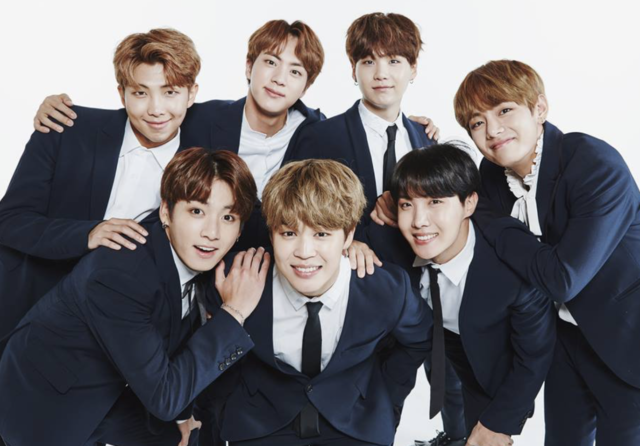 Golden K-pop 2025' '' '' '' 'suits' 'smiling' 'group' 'photography.