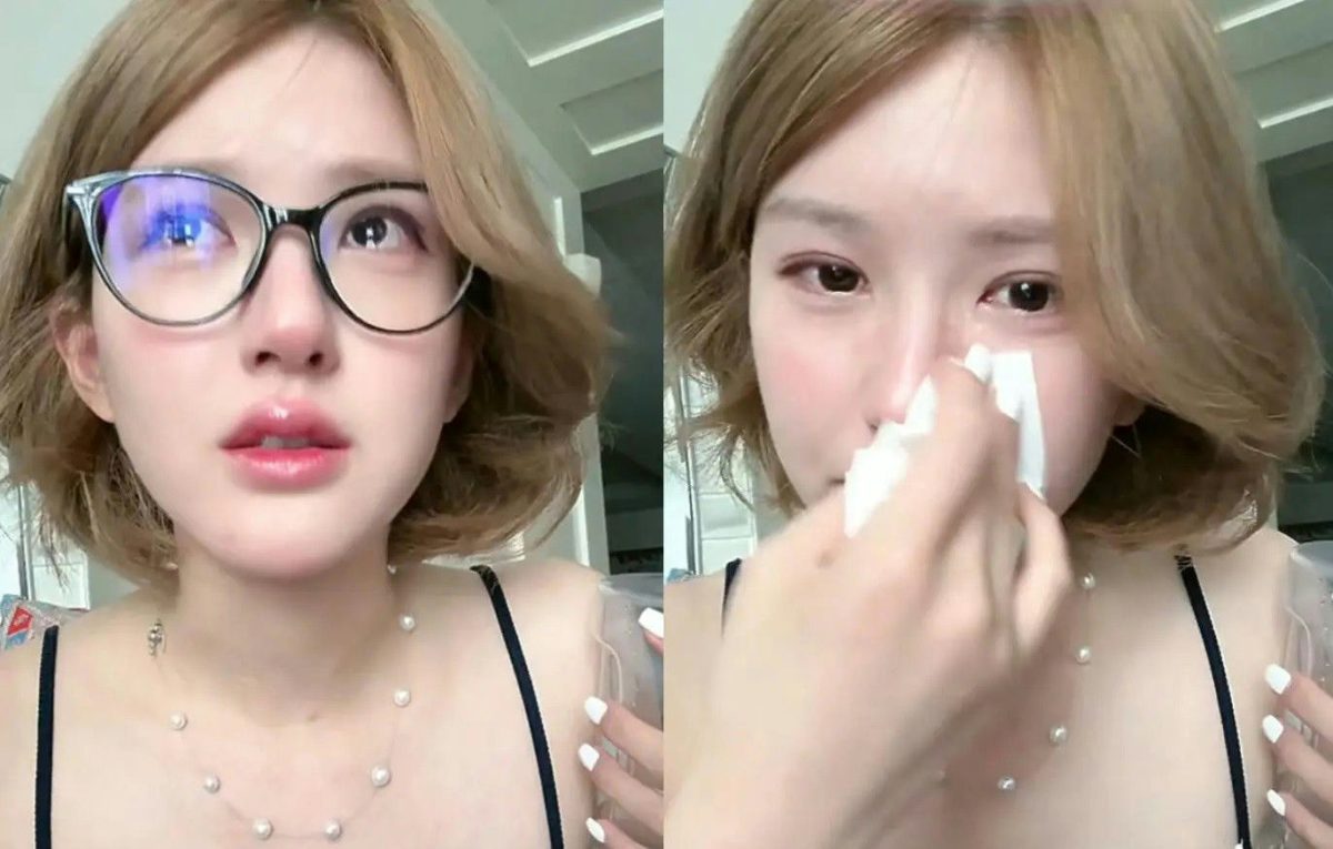 Zhao Lusi agency scandalperson' 'crying' 'tissue' 'glasses' 'necklace.
