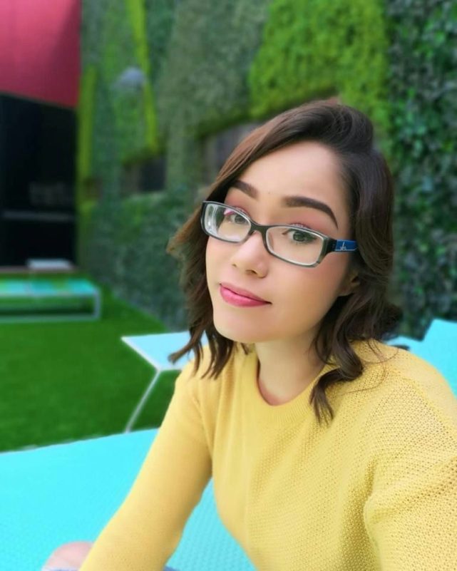 Yanin Campos deathperson' 'woman' 'glasses' 'yellow' 'foliage.