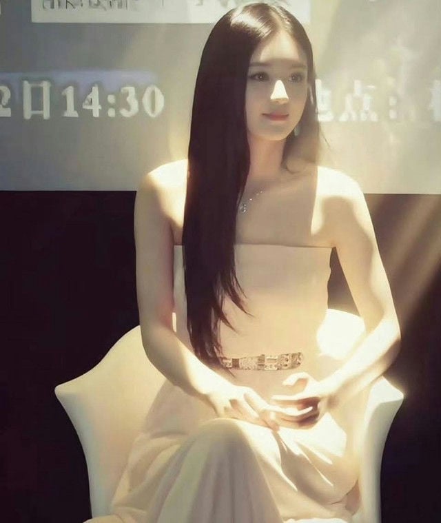 Zhao Liying Dior ambassadorperson' 'seated' 'dress' 'elegant' 'longhair.
