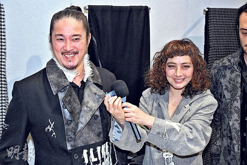 Conroy Chan Macau tycoon son-in-lawpeople' 'interview' 'microphone' 'fashion' 'coat.