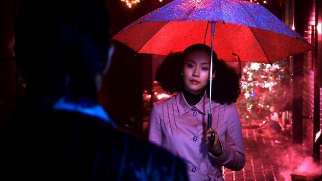 Memories of Matsuko movie re-releasepeople' 'umbrella' 'rain' 'city' 'night.