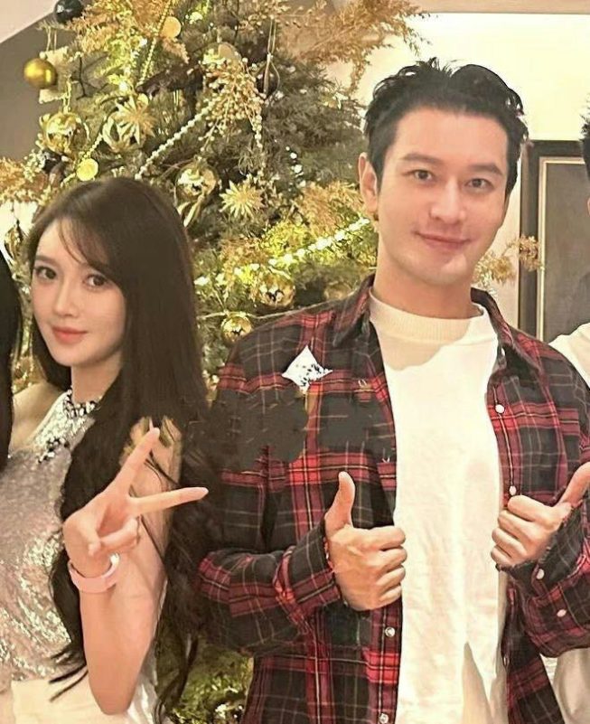 Huang Xiaoming Ye Ke scandalpeople' '' 'hristmas' 'flannel' 'smiling' 'peace' 'sign.
