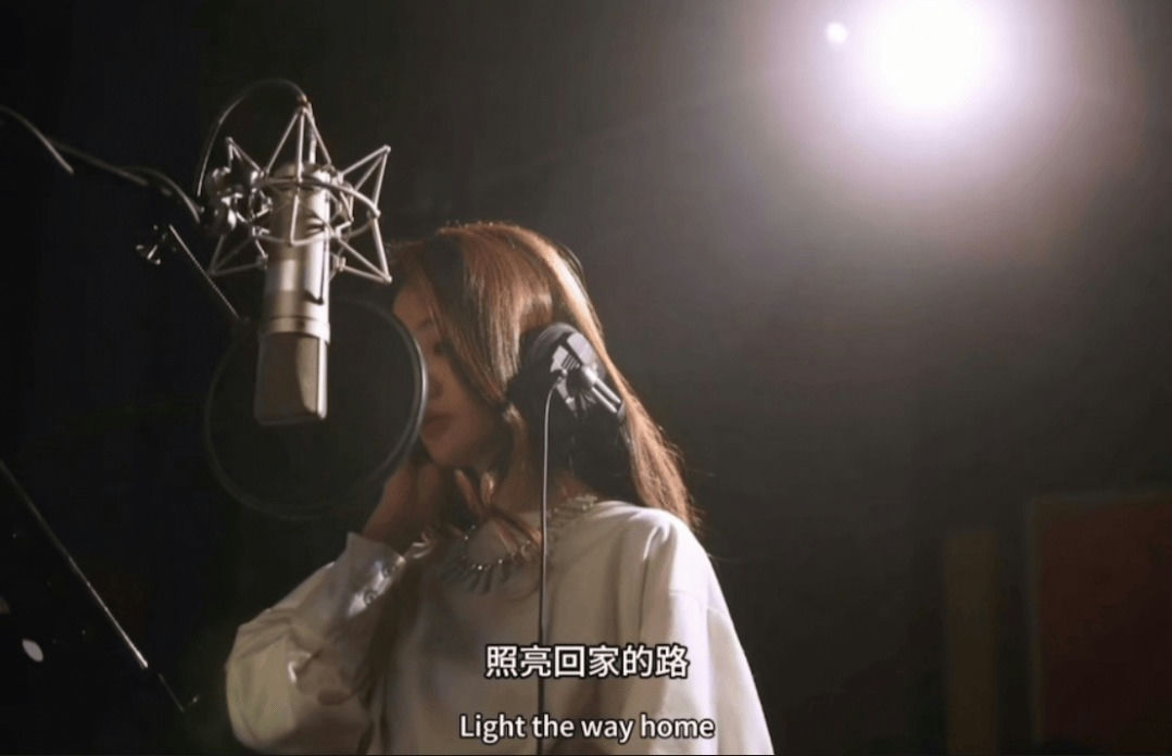 Zheng Shuang comeback fugitive tycoonperson' 'singing' 'microphone' 'studio' 'headphones.