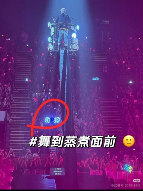 G-Dragon Seungri concert signspeople' 'crowd' 'music' 'performance' 'lift.