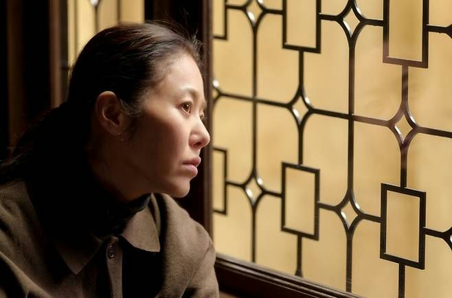Go Hyun-jung serial killer transformationwoman' 'window' 'pensive' 'brooding' 'portrait.