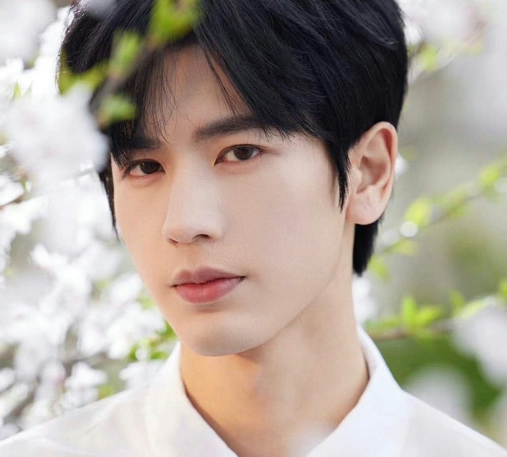 Zhang Linghe harassmentpeople' 'portrait' 'flowers' 'young' 'man' 'white' 'shirt.