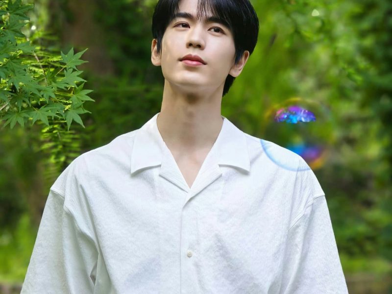 Zhang Linghe harassmentman' 'outdoors' 'white' 'shirt' 'bubble' 'serene.