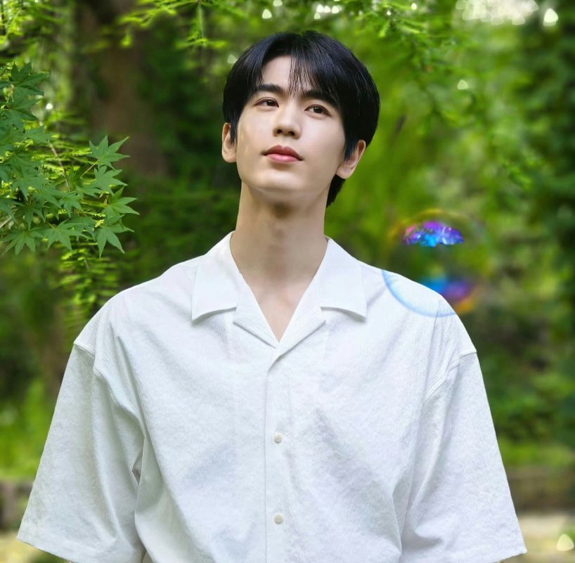 Zhang Linghe harassmentman' 'outdoors' 'white' 'shirt' 'bubble' 'serene.