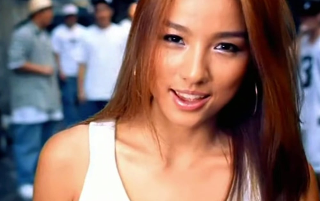 naturally tanned female celebritiespeople' 'woman' 'smiling' 'earrings' 'tanktop.