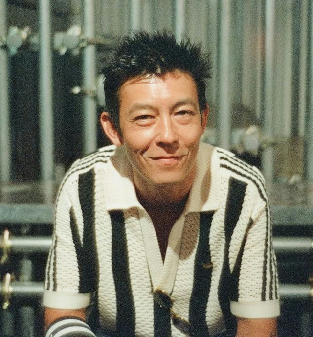 Edison Chen Nike lawsuitpeople' 'man' 'portrait' 'stripes' 'smile.