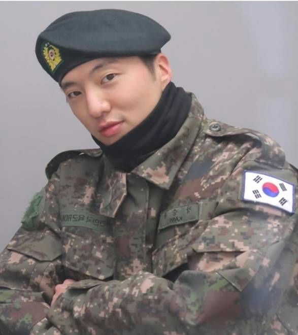 Kang Seung-yoon Liberation Day flag traditionperson' 'military' 'beret' 'camouflage' '' 'orean' 'flag.
