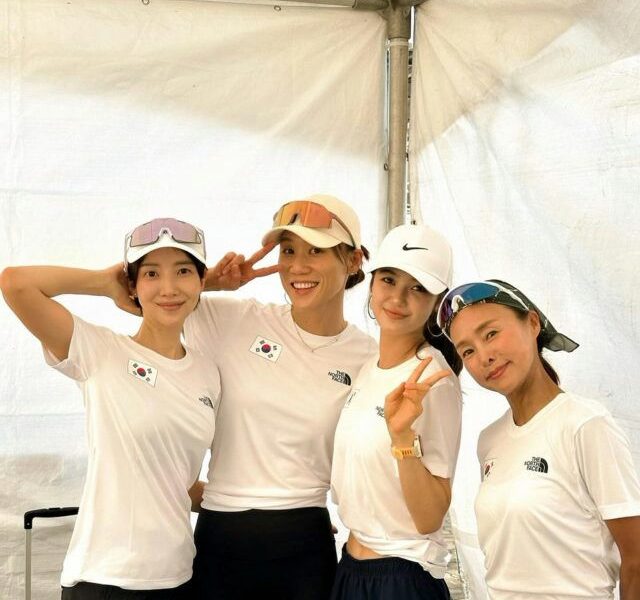 NJZ Danielle marathonpeople' 'four' 'sunglasses' 'uniforms' 'posing' '' '.