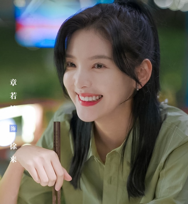 Chinese actresses beautiful smileswoman' 'smiling' 'earring' 'chopsticks' 'green.
