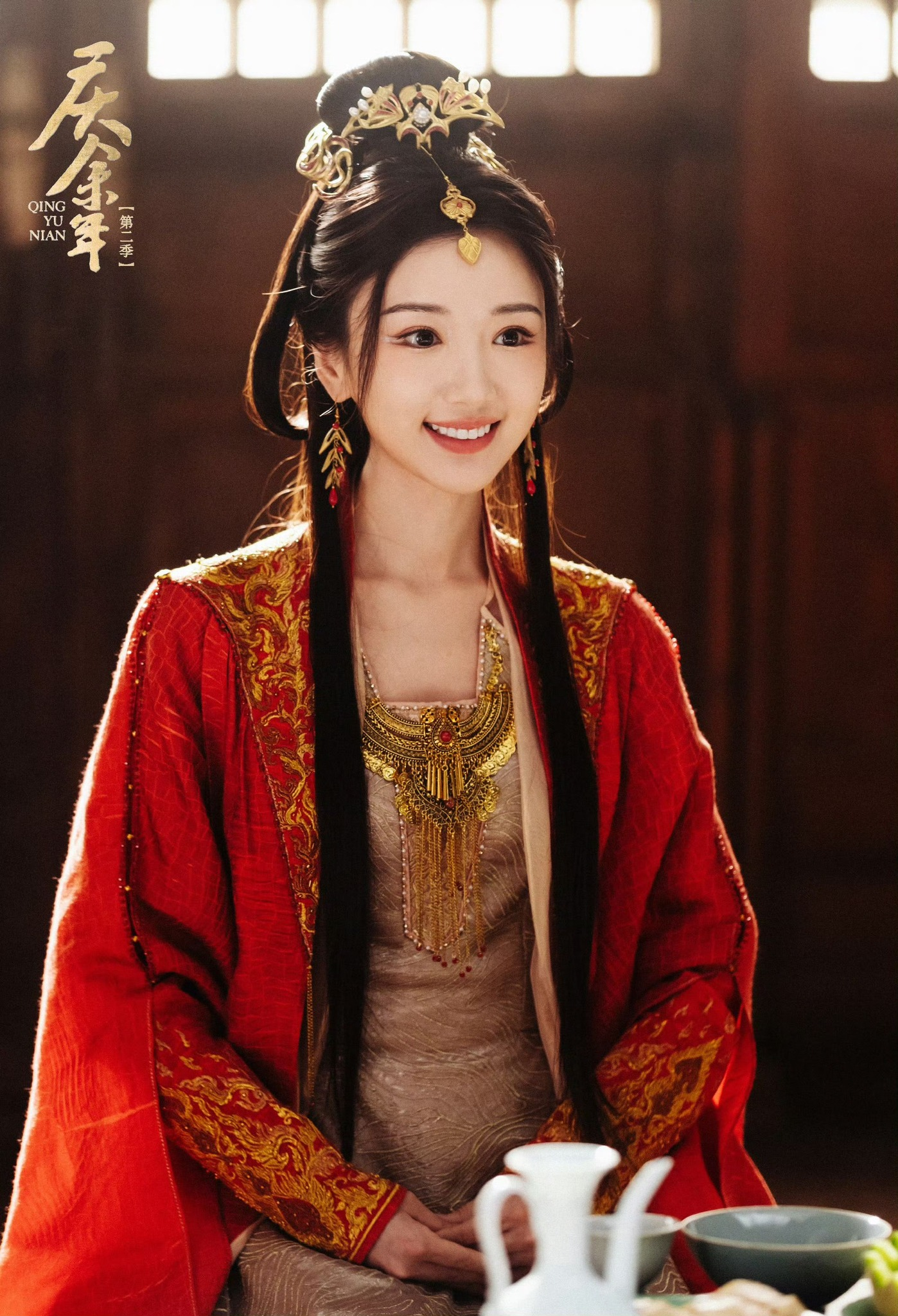 Chinese actresses beautiful smileswoman' 'smiling' 'ornate' 'red' 'robe.