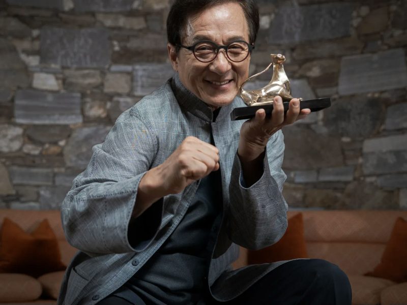 Jackie Chan The Shadow's Edgeperson' '' 'ackie' 'han' 'award' 'smiling' 'celebrating.