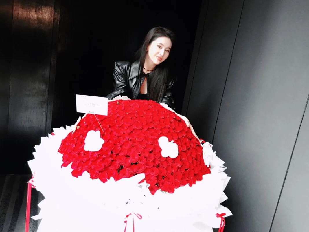 Liu Yifei public appearancewoman' 'roses' 'bouquet' 'jacket.