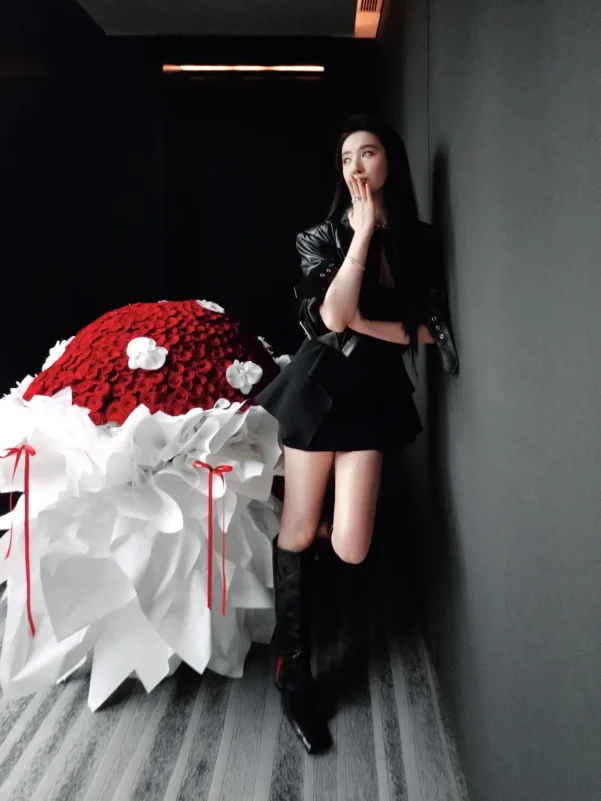 Liu Yifei public appearancewoman' 'bouquet' 'leatherjacket' 'boots.