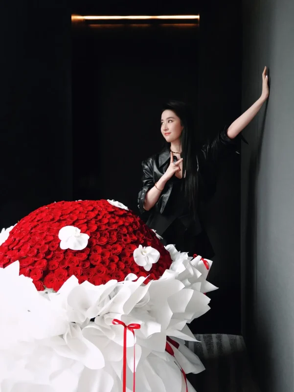Liu Yifei public appearancewoman' 'roses' 'bouquet' 'leatherjacket.